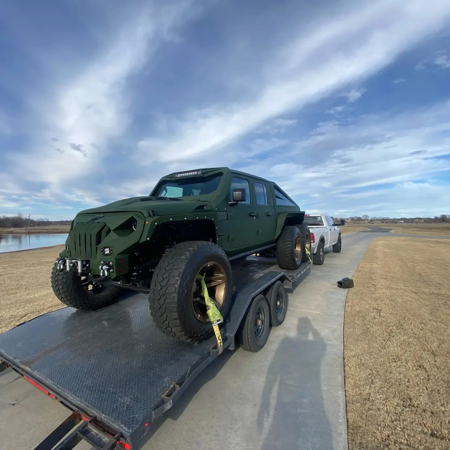 Custom military Jeep on deckover trailer rental Oklahoma