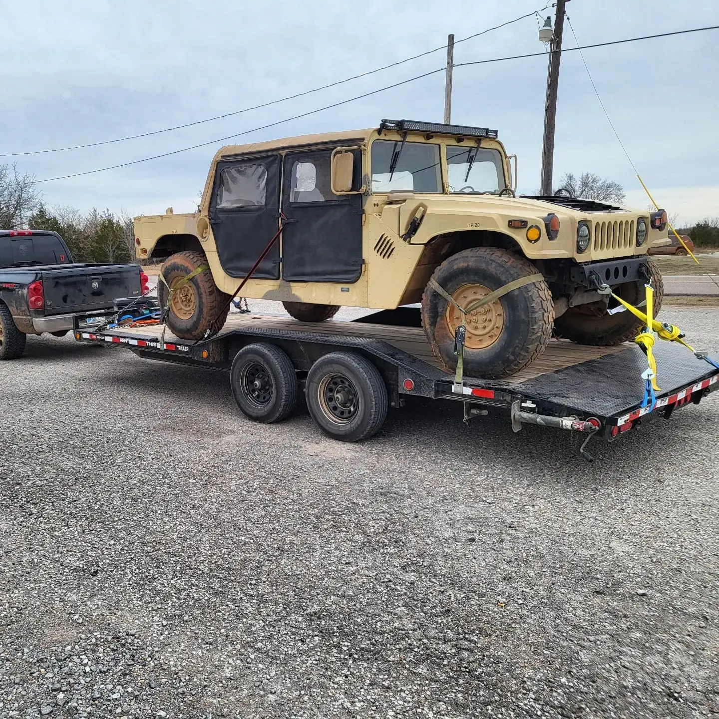 Military Humvee on equipment trailer rental OKC